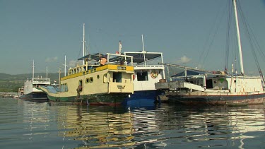 Boating by a busy harbour