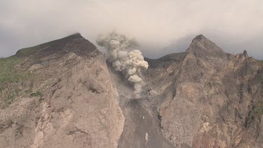 Komba volcano erupting