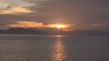 Sunset over the coast seen from the Seven Seas ship