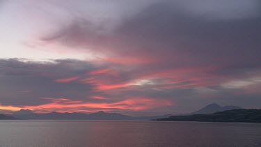 Sunset over the coast seen from the Seven Seas ship