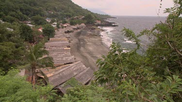 Boat sheds on a beach