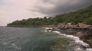 Boat sheds on the beach