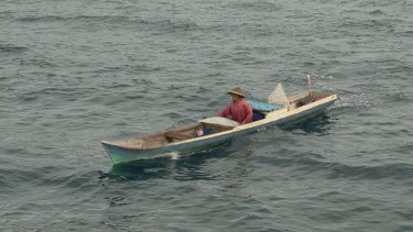 Angle fishermen in low boats