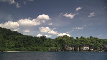 Native huts seen along the scenic Wetar coast