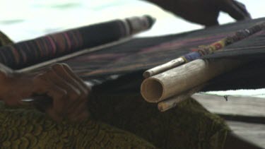 Close up of a woman practicing ikat