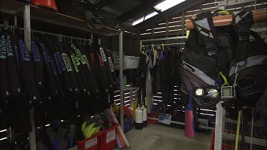 Room full of assorted equipment for scuba diving