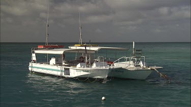 Pair of dive boats anchored in the ocean