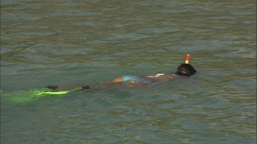 Girl does snorkelling