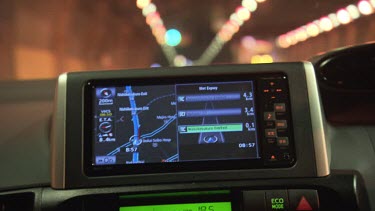 Driving a car through a tunnel with a GPS on the dashboard