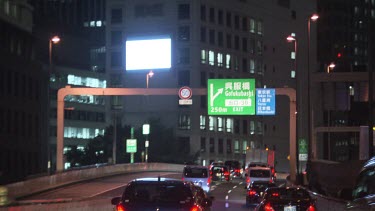 Traffic on a city highway at night