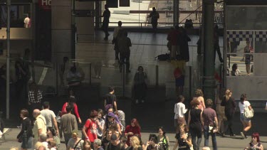 Pedestrians at a busy intersection