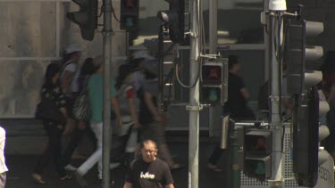 Pedestrians at a busy intersection