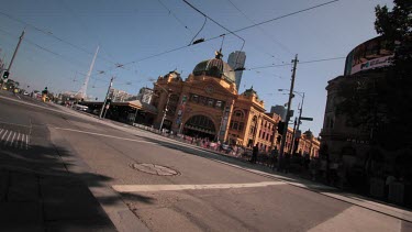 Time lapse of traffic and pedestrians on a busy city street