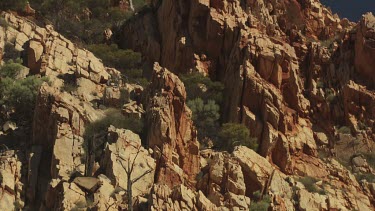 High, rocky cliffs against a blue sky