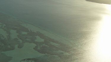 Sunlight reflected on the still ocean
