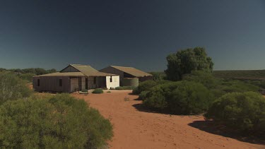 Quiet farmstead at the end of a dirt path