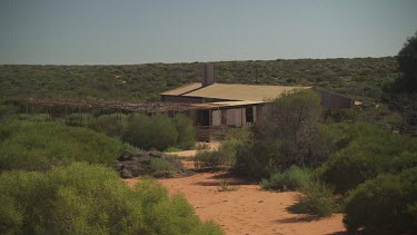 Quiet farmstead at the end of a dirt path