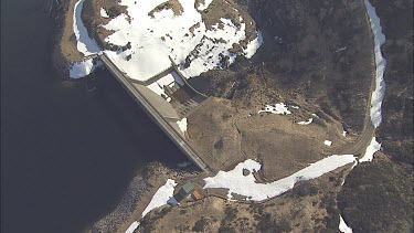 Dam in a snowy mountain pass