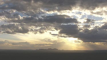 Golden sky and clouds in a dramatic sunset