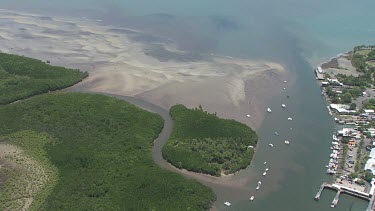 Aerial view of the ocean and a forested coast in Daintree National Park