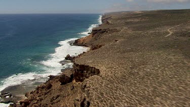 Aerial View of Western Australia Coastline - Ocean Waves crashing against the rocks