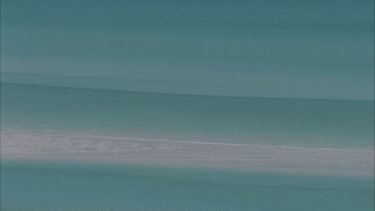 WS of Whitehaven beach with contrasting white sands and blue clear water