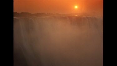 Red sky and sunset over Victoria Falls, Zimbabwe