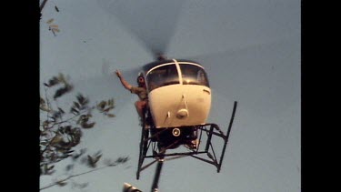 Helicopter flying close to ground