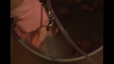 Meat Being Washed By Jet Of Water In Spinning Machine