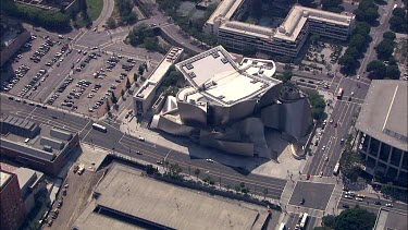 Walt Disney Concert Hall Los Angeles. Architecture, architect Frank Gehry. Deconstruction deconstructive movement, free formed curves and shapes. Parking lots