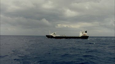 Container ship on open ocean