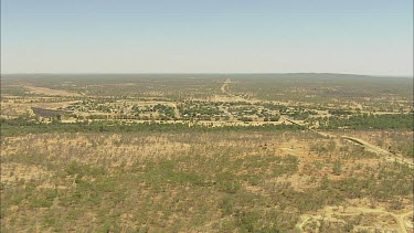 Aerial Burketown, Tropical North Queensland. The Gulf Savannah. Far North-western Queensland. Tropical region but quite dry and arid, dry river bed meanders through dry savannah. Gulf of Carpentaria....