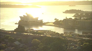 Sunset Sydney, Circular Quay with Opera House and city and Harbour Bridge. The Rocks.
