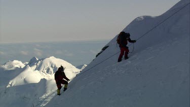 Aerial of Mount Everest:Two Climbers climbing