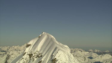Aerial of Mount Everest: Climber on peak