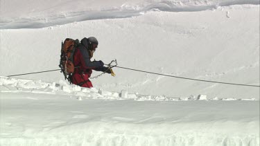 Aerial of Mount Everest: Climbers - Helping trouble climber