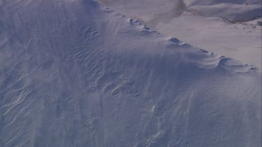 Aerial of Mount Everest: Snow blowing on surface