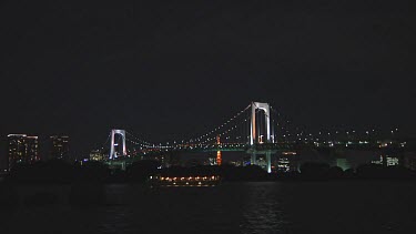 Small boats at anchor near the Rainbow Bridge, Tokyo