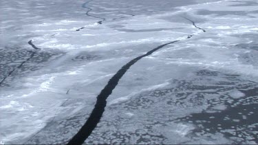 Aerial view of the sea ice on Antarctica breaking up