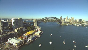 Sydney Harbour from North over Luna Park and Milson's Point, Kirribilli. Bridge with city CBD on rhs.