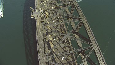 Sydney Harbour Bridge with tourists climbing bridge. Close Up High Angle.