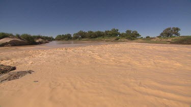 Flooding Diamantina River in middle of Simpson Desert. Pan