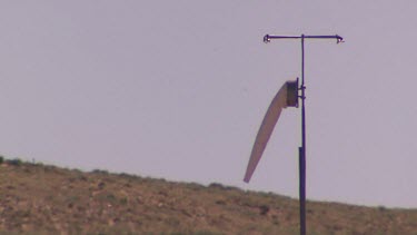 Windsock at airport measures wind speed and direction (no wind)