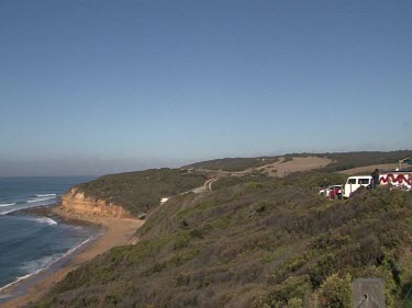 Cars parked on cliff overlooking the Beach.
