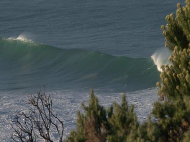 Rolling waves and spray