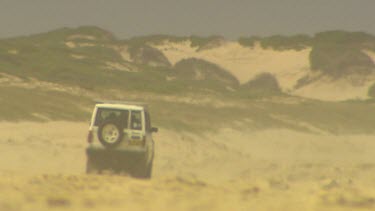 Wheels, tyre of 4wd. Four wheel drive driving on beach