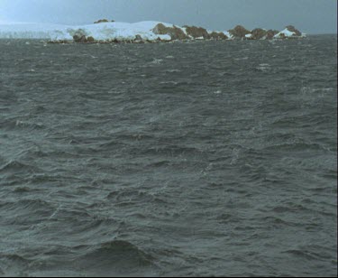 D'urville Sea and islands grey and stormy seas.