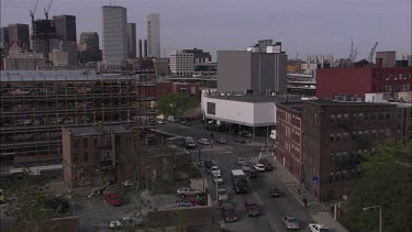 Ambulance driving through trafic in south Boston, filmed from a distance.