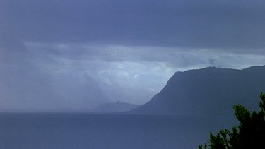 Rainfront sweeps over land