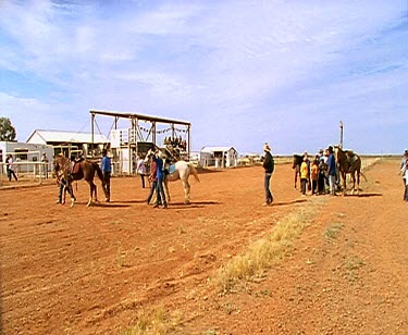 Horse racing in outback. Pony races. Running with horses ponies. Rural